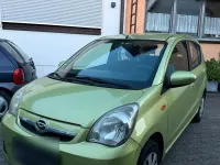 Brugt Daihatsu Cuore 70 HK (51 kW) 2010 Grøn Hatchback
