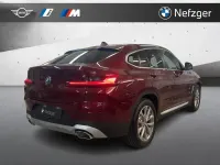 Gebraucht BMW X4 Performance 184 PS (135 kW) 2023 Aventurinrot iii metallic SUV