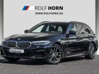 Gebraucht BMW 520 M Sport 190 PS (139 kW) 2023 M carbonschwarz metallic Kombi
