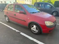 Second-hand Opel Corsa Comfort 90 CP (66 kW) 2002 Roșu Hatchback