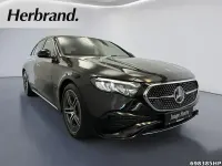 Gebraucht Mercedes E220 AMG 197 PS (144 kW) 2024 Metalliclack obsidianschwarz m Limousine