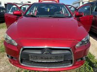 Gebraucht Mitsubishi Lancer Inform 140 PS (102 kW) 2009 Rot Limousine