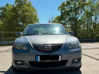 Używany Mazda 3 105 KM (77 kW) 2007 Szary Sedan/Limuzyna