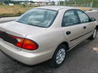 Gebraucht Mazda 323 Comfort 88 PS (64 kW) 1996 Beige Limousine