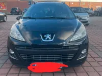Gebraucht Peugeot 207 95 PS (69 kW) 2011 Schwarz Kombi