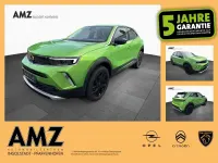 Gebraucht Opel Mokka Elegance 136 PS (100 kW) 2023 Lackierung matcha green/typ au SUV