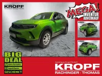 Gebraucht Opel Mokka Enjoy 136 PS (100 kW) 2023 Lackierung matcha green/typ au SUV