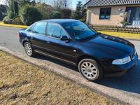 Używany Audi A4 125 KM (91 kW) 2001 Czarny Sedan/Limuzyna