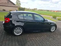 Używany BMW 116 122 KM (89 kW) 2008 Czarny Hatchback