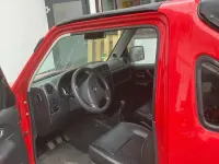 Używany Suzuki Jimny 86 KM (63 kW) 2009 Czerwony SUV