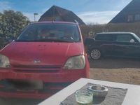 Gebraucht Daihatsu Cuore 58 PS (42 kW) 2006 Rot Kleinwagen
