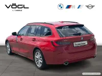 Gebraucht BMW 330e Sport Line 292 PS (214 kW) 2024 Melbourne red Kombi
