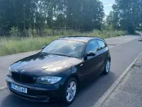 Gebraucht BMW 116 122 PS (89 kW) 2009 Schwarz Kleinwagen