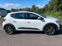 Gebraucht Dacia Sandero Expression 95 PS (69 kW) 2024 Weiß SUV