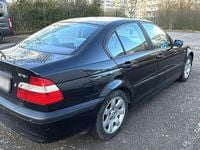 Second-hand BMW 318 143 CP (105 kW) 2004 Negru Berlinǎ