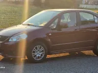 Gebraucht Suzuki SX4 107 PS (78 kW) 2010 Rot Limousine