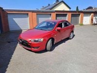 Gebraucht Mitsubishi Lancer 117 PS (86 kW) 2010 Rot Limousine