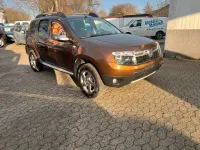 Używany Dacia Duster Prestige 105 KM (77 kW) 2012 Brązowy Minivan
