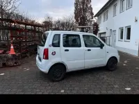 Używany Opel Agila 60 KM (44 kW) 2007 Biały Sedan/Limuzyna