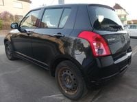 Second-hand Suzuki Swift 92 CP (67 kW) 2009 Negru Hatchback