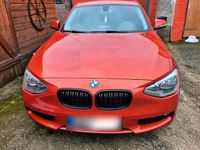 Gebraucht BMW 114 102 PS (75 kW) 2012 Orange Kleinwagen