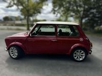 Second-hand Rover Mini 63 CP (46 kW) 2000 Roșu Coupe
