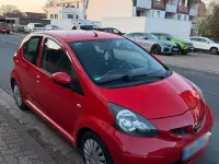 Gebraucht Toyota Aygo 68 PS (50 kW) 2007 Rot Kleinwagen