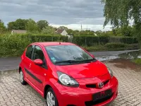 Gebraucht Toyota Aygo 67 PS (49 kW) 2009 Rot Kleinwagen