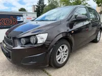 Usado Chevrolet Aveo LT 101 HP (74 kW) 2013 Castanho Citadino