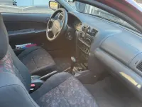 Gebraucht Mazda 323 88 PS (64 kW) 1997 Rot Kleinwagen