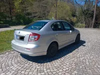 Second-hand Suzuki SX4 120 CP (88 kW) 2012 Argintiu Berlinǎ