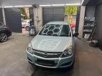 Używany Opel Astra 90 KM (66 kW) 2009 Niebieski Kombi