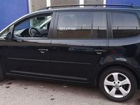 Gebraucht VW Touran 105 PS (77 kW) 2012 Schwarz Van / Kleinbus