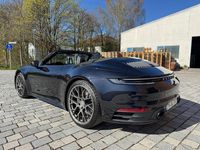 Gebraucht Porsche 992 385 PS (283 kW) 2024 Schwarz Cabrio