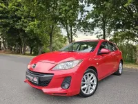 Używany Mazda 3 Edition 150 KM (110 kW) 2012 Czerwony Sedan/Limuzyna