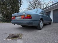 Second-hand Mercedes E250 90 CP (66 kW) 1987 Argintiu Berlinǎ