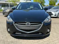 Używany Mazda 2 Edition 90 KM (66 kW) 2015 Czarny Sedan/Limuzyna