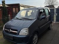 Używany Opel Agila 60 KM (44 kW) 2006 Niebieski Hatchback