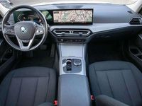 Gebraucht BMW 320e 204 PS (150 kW) 2022 Alpinweiß uni Kombi