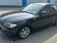 Second-hand BMW 116 122 CP (89 kW) 2009 Negru Hatchback