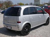 Second-hand Opel Meriva 90 CP (66 kW) 2010 Argintiu Monovolum