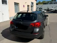 Usado Opel Astra 110 HP (80 kW) 2012 Cinzento Carrinha