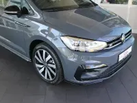 Gebraucht VW Touran Highline 150 PS (110 kW) 2024 Grau (delfingrau metallic) Van / Kleinbus
