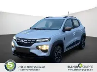 Gebraucht Dacia Spring Extreme 47 kW (65 PS) 2023 Diamantsilbergrau Kleinwagen