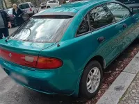 Gebraucht Mazda 323 88 PS (64 kW) 1994 Grün Limousine