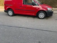 Second-hand VW Caddy 109 CP (80 kW) 2011 Negru Monovolum
