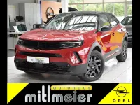 Gebraucht Opel Mokka-e 100 kW (136 PS) 2024 Rot kosmos rot met. SUV
