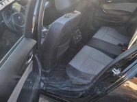 Second-hand BMW 120 142 CP (104 kW) 2012 Negru Hatchback