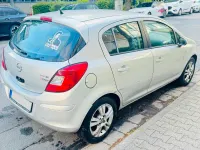 Usado Opel Corsa 101 HP (74 kW) 2013 Prateado Citadino