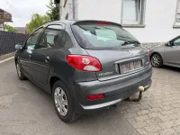 Gebraucht Peugeot 206 73 PS (53 kW) 2012 Grau Limousine
